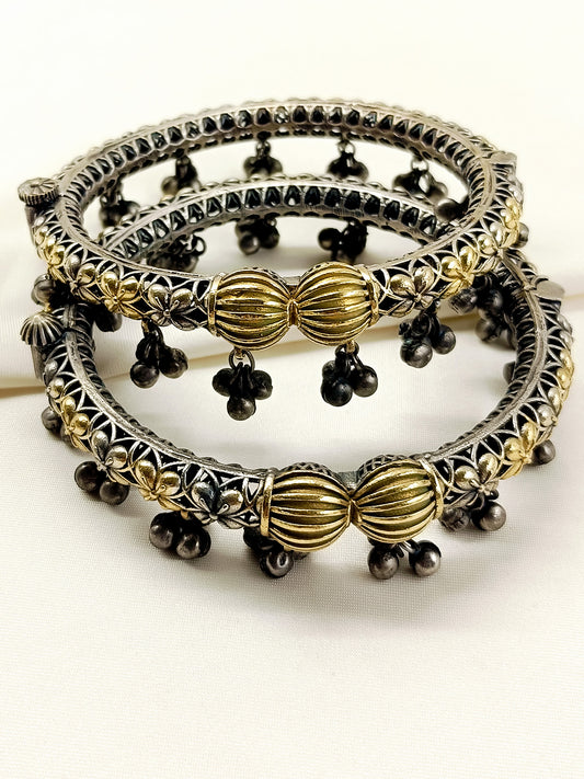 Charulata Dual-Tone Oxidized Floral Ghungroo Anklets