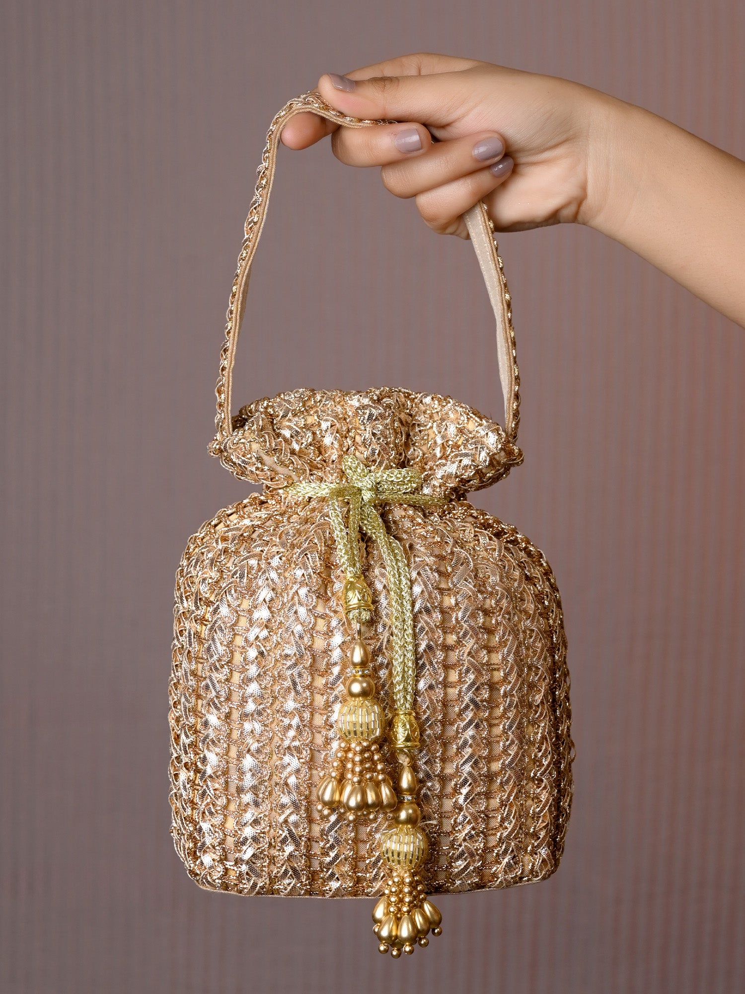 Gold potli bag sale