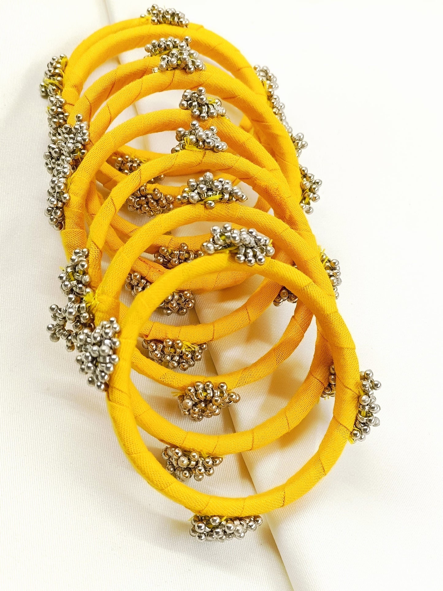 Pranjal Yellow Fabric Bangles with Ghungroo