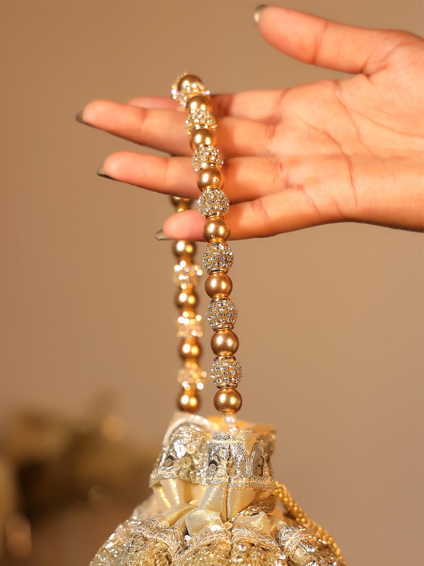 Elaya Copper Potli Bag