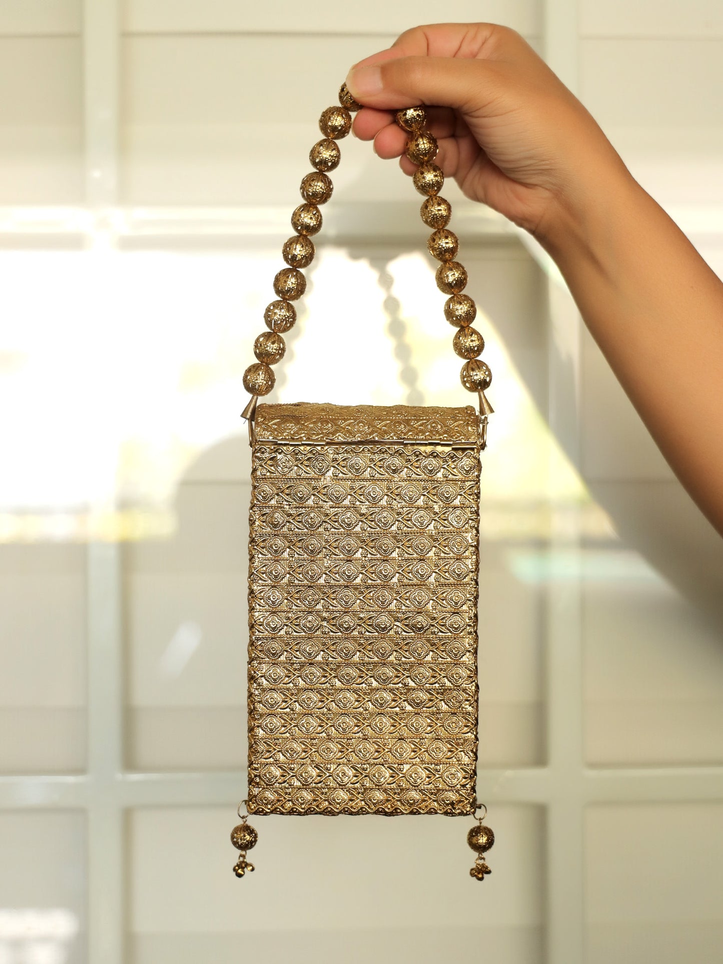 Kiran Ruby Golden Mobile Pouch