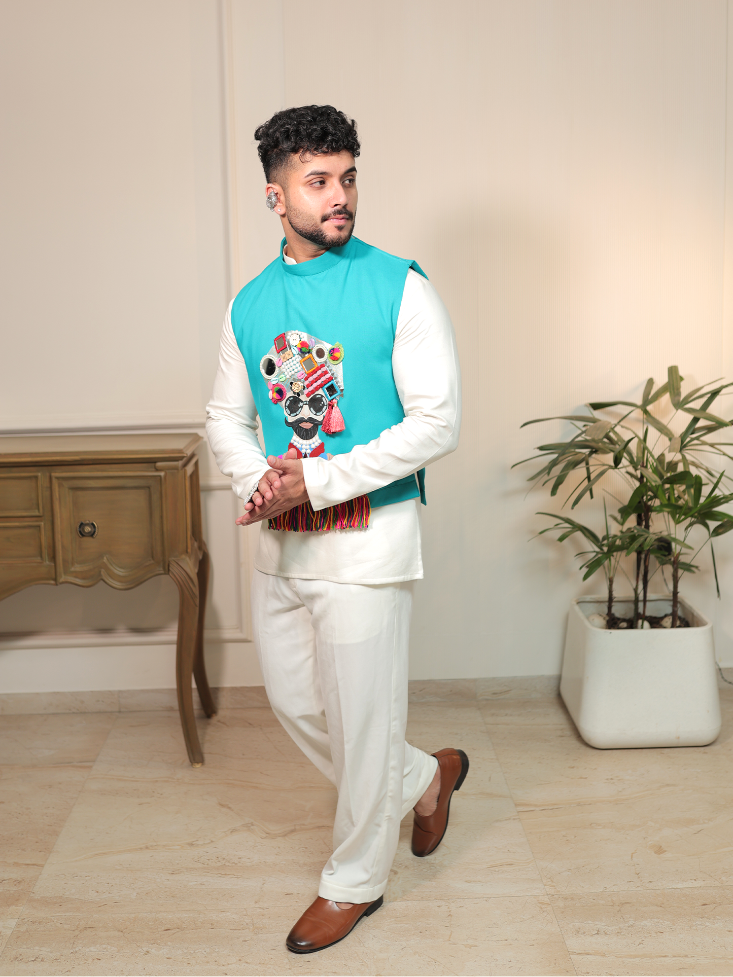 Panshul Garba Turquoise Swag Jacket Set.