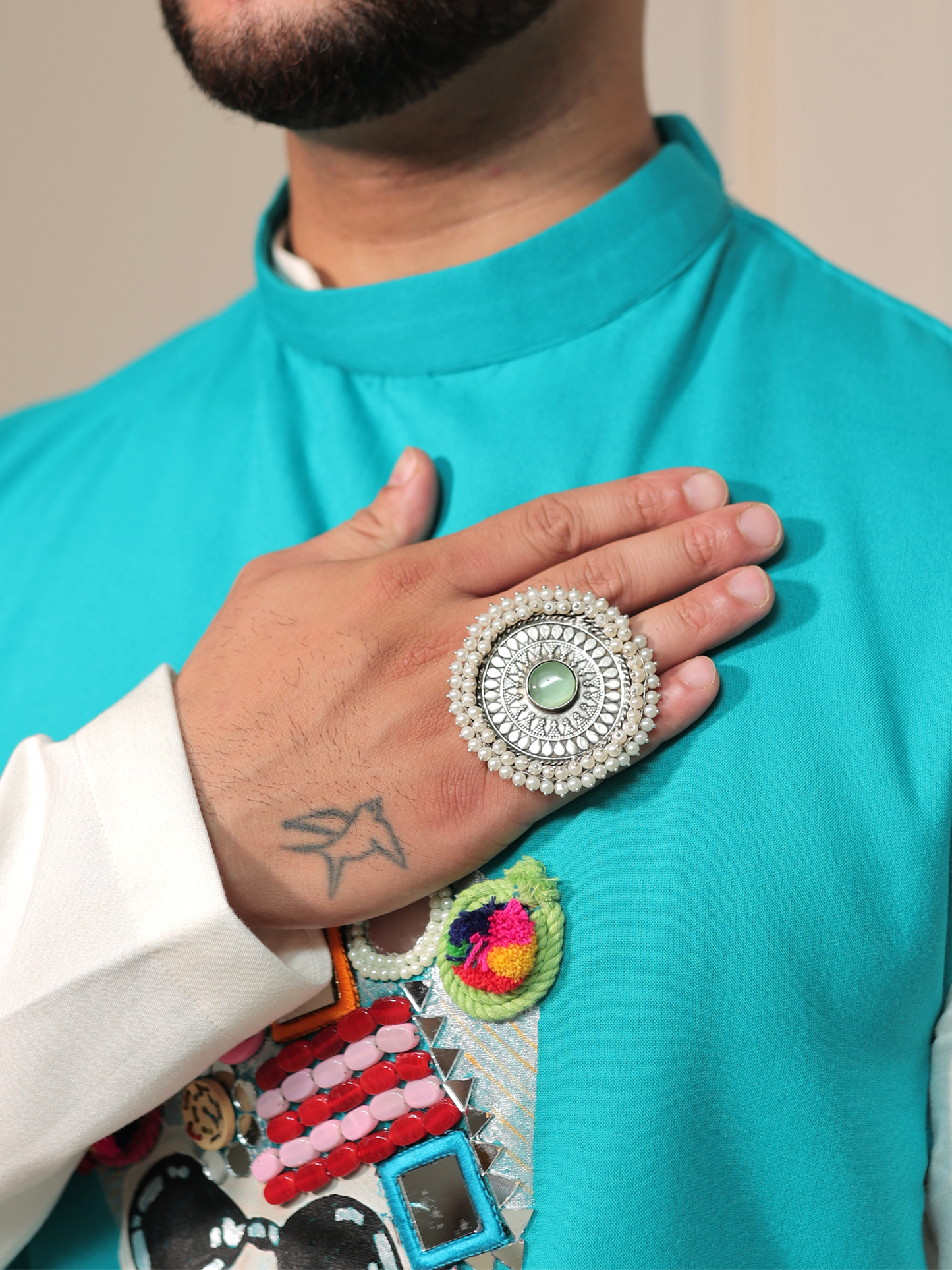 Panshul Garba Turquoise Swag Jacket Set.