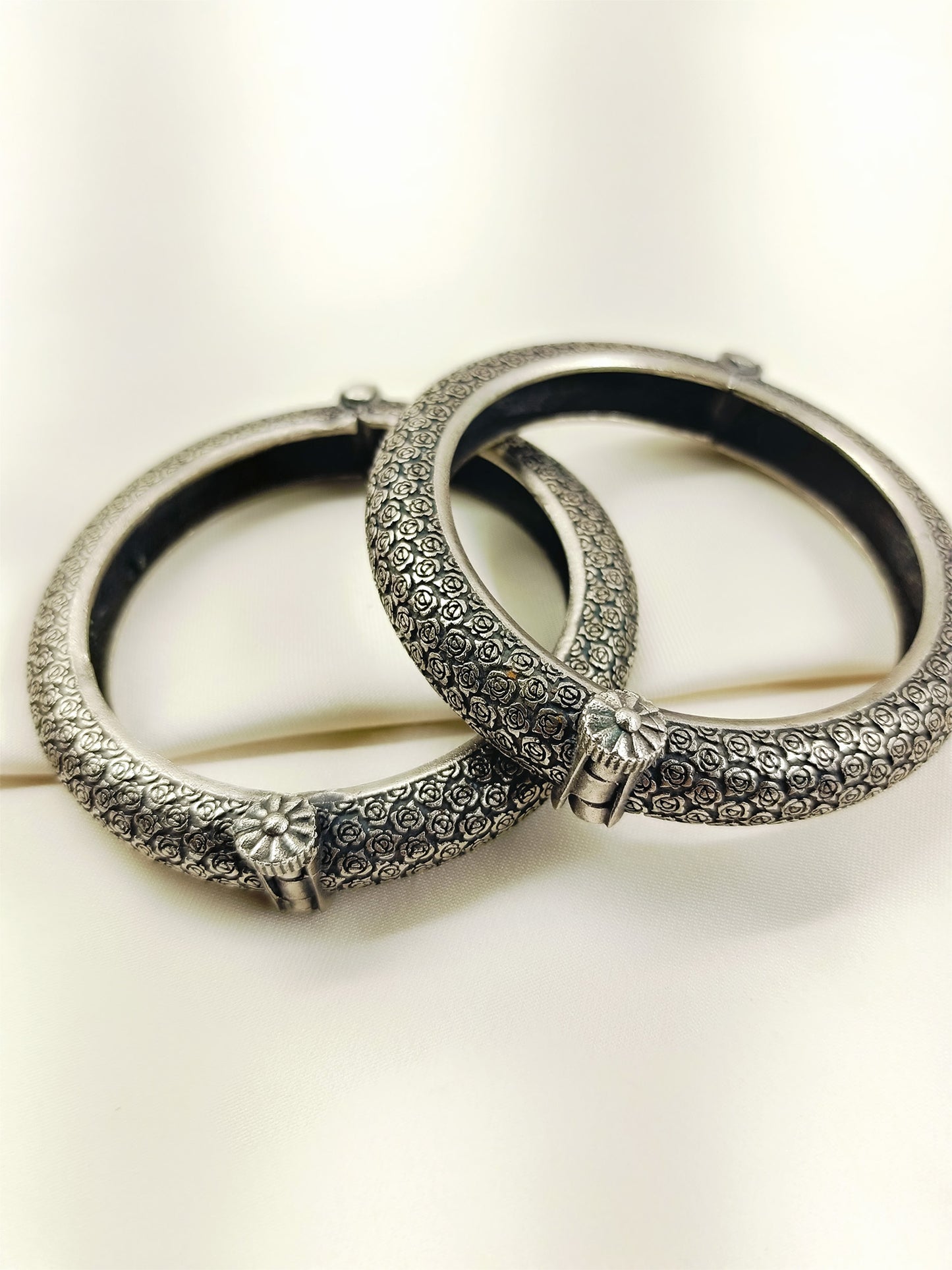 Abhigya Silver Rose Carved Oxidized Bangles