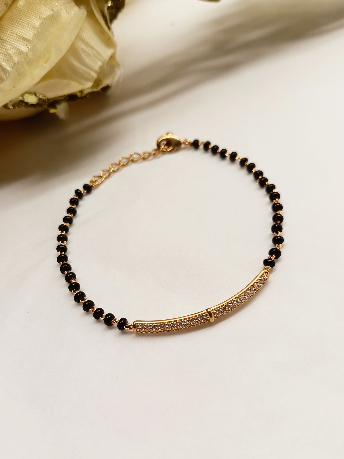 Mishel Diamond Piece With Black Beads Gold Plated Hand Mangal Sutra