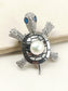 Amla White Pearl Turple Brooch