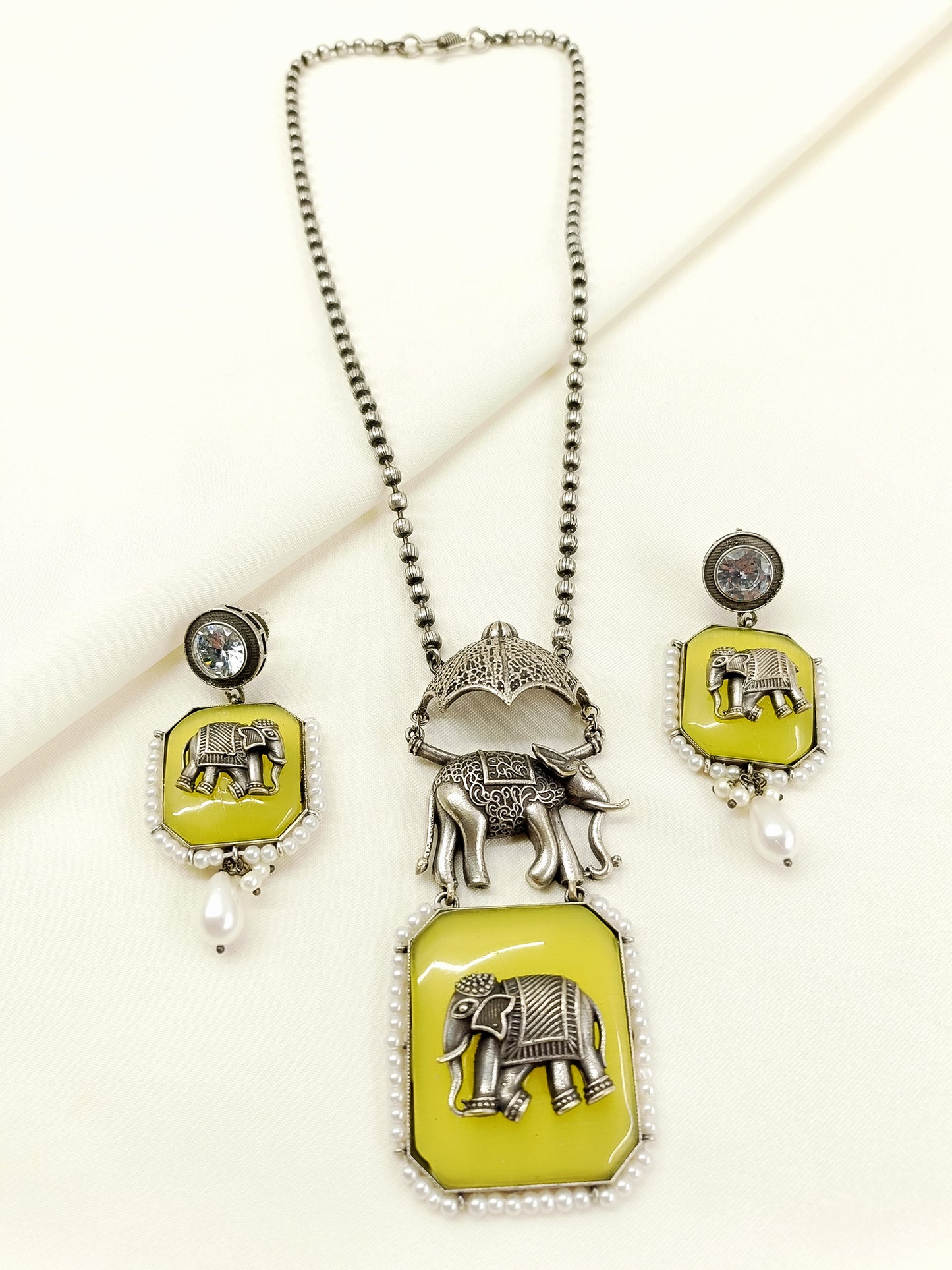 Pramila Yellow Oxidized Elephant Pendant Set
