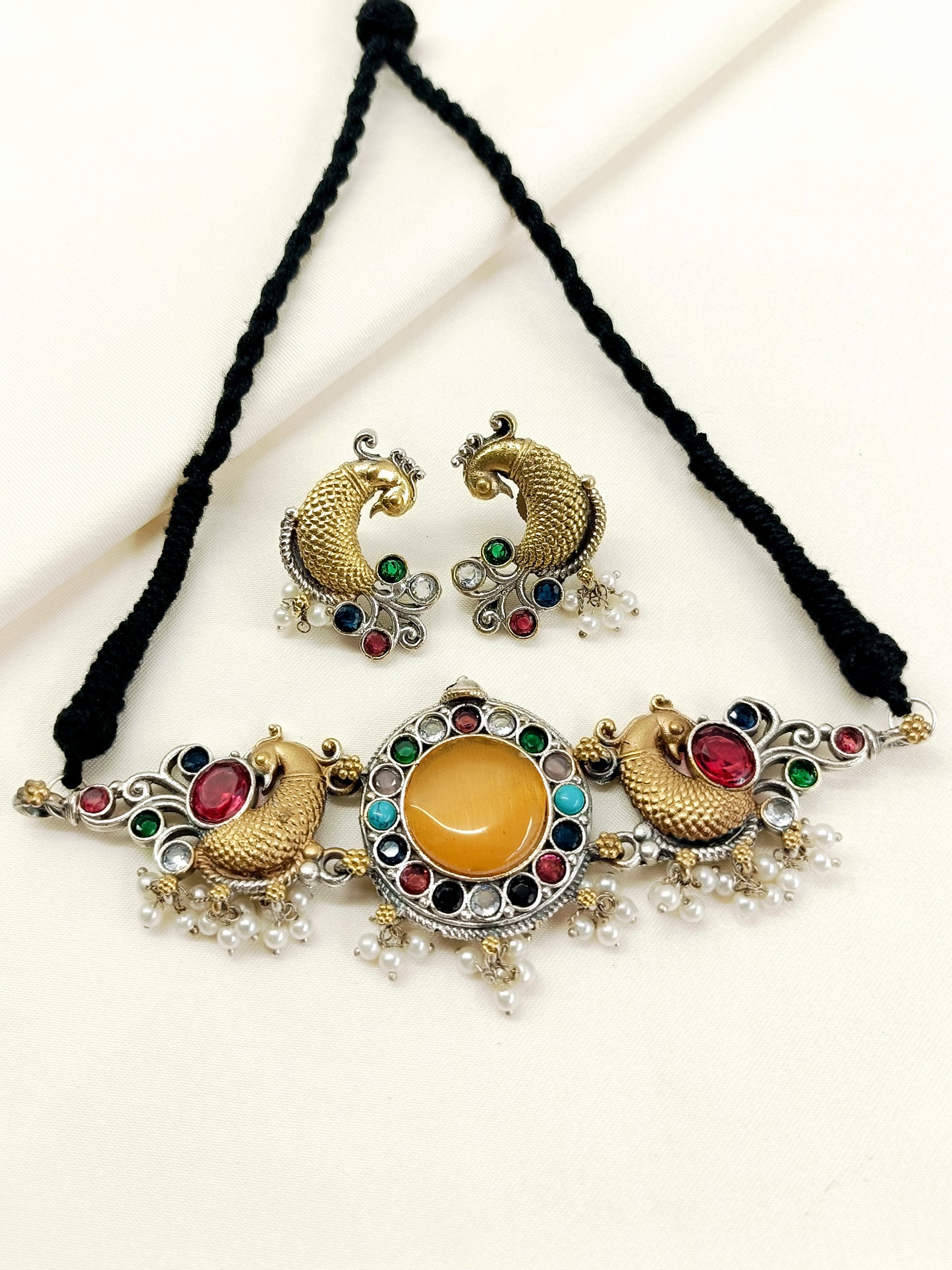 Jigna Yellow Oxidized Dual-Tone Peacock Navratna Choker Set