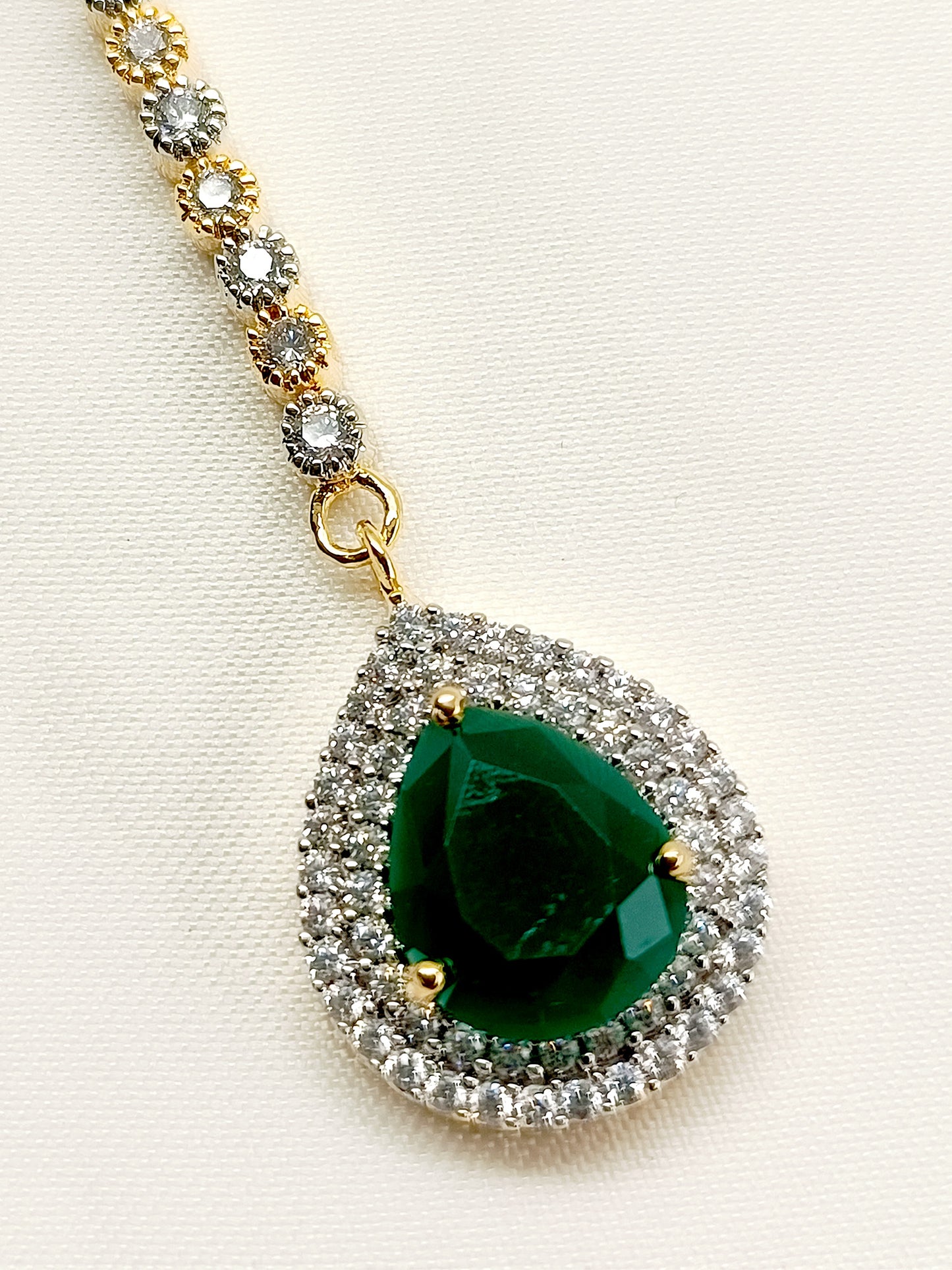 Bhavyata Green American Diamond Teeka