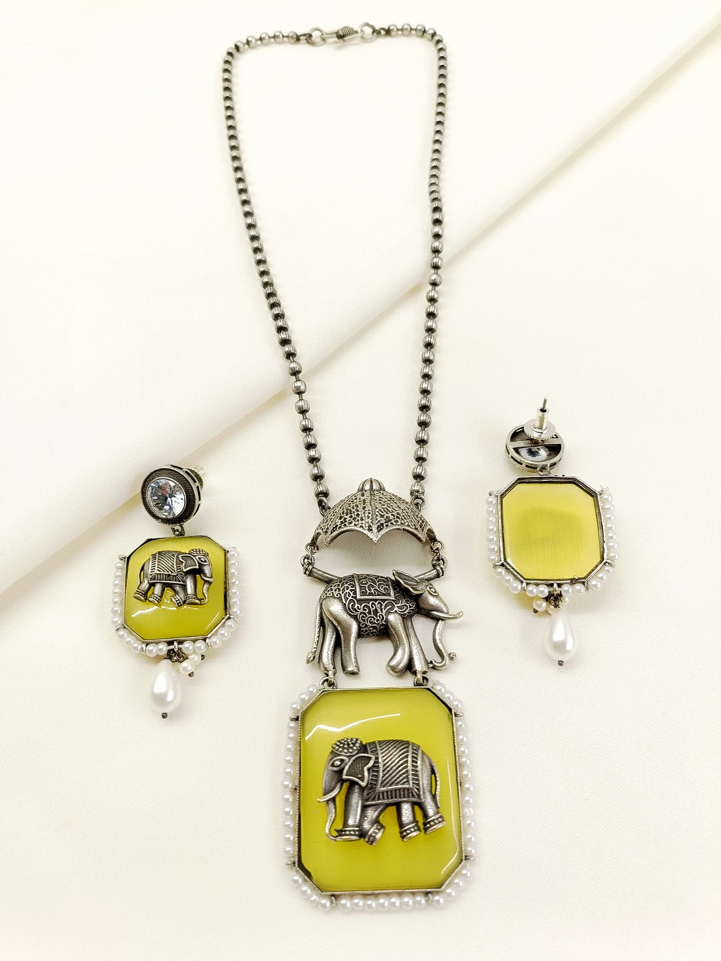 Pramila Yellow Oxidized Elephant Pendant Set