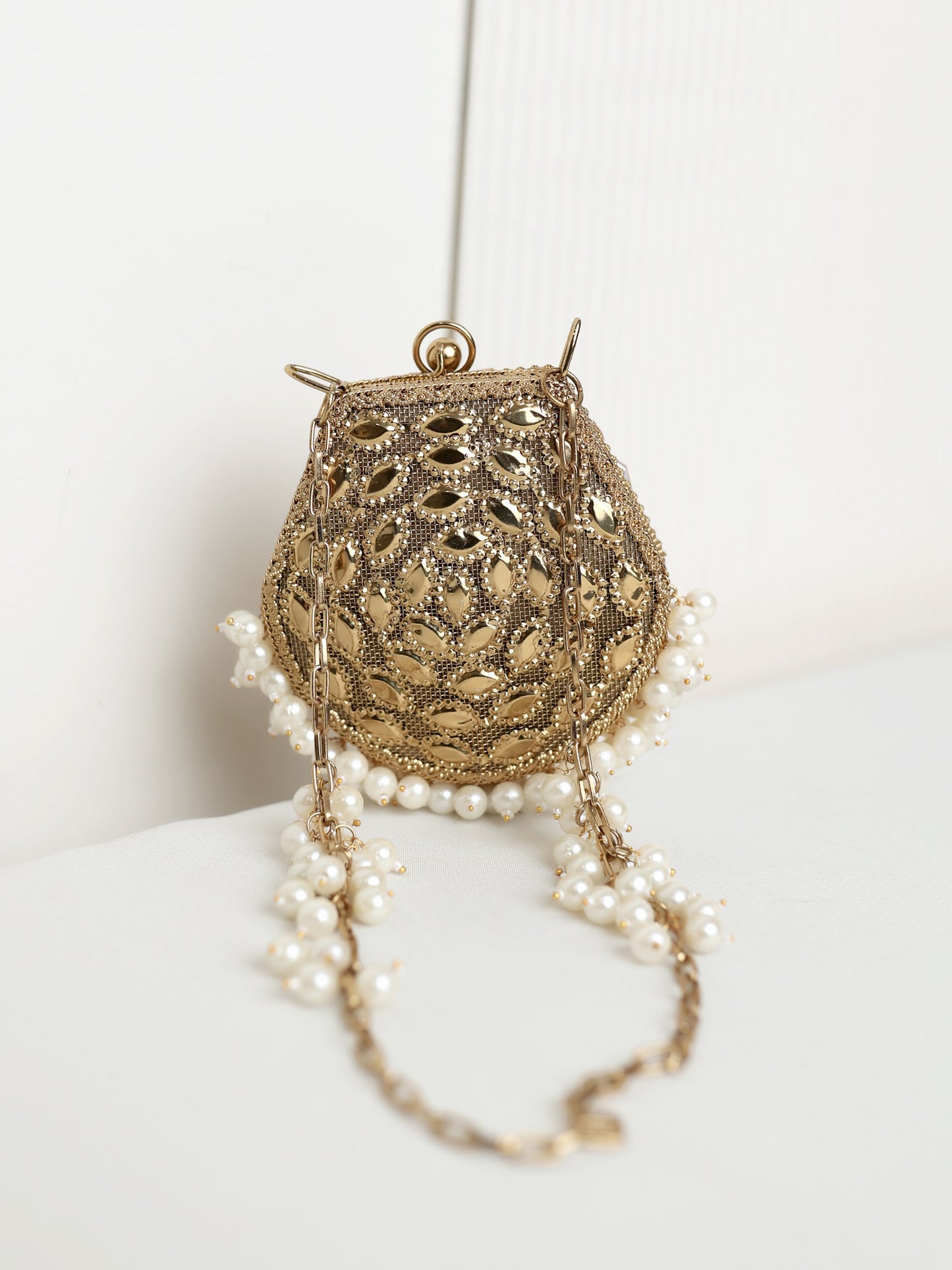 Neeya Golden Mini Metal Clutch