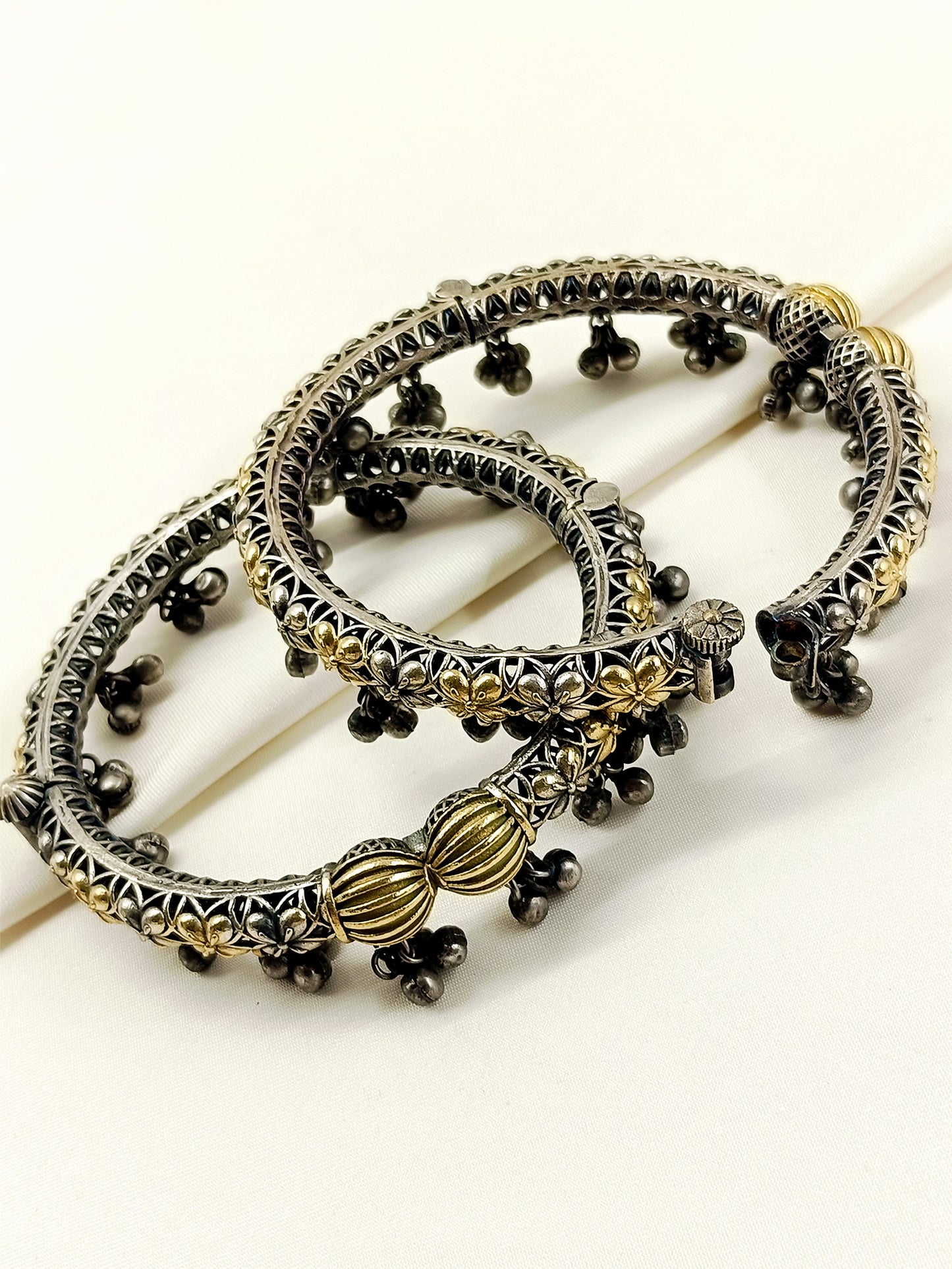 Charulata Dual-Tone Oxidized Floral Ghungroo Anklets