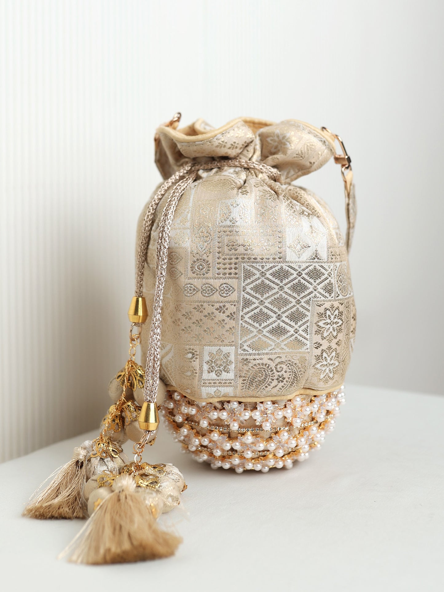 Camilla Golden Ivory Banarasi Brocade Potli Bag with Pearl Base