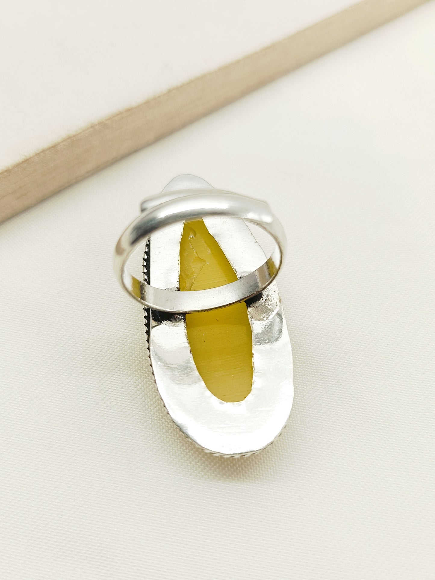 Abhiprithi Yellow Drop Shape Oxidized Finger Ring