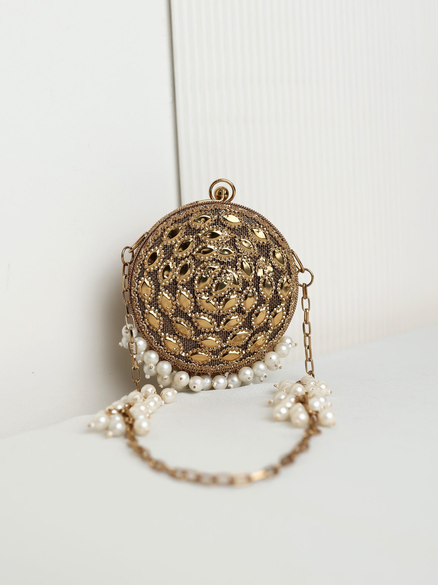 Arshika Round Golden Mini Metal Clutch