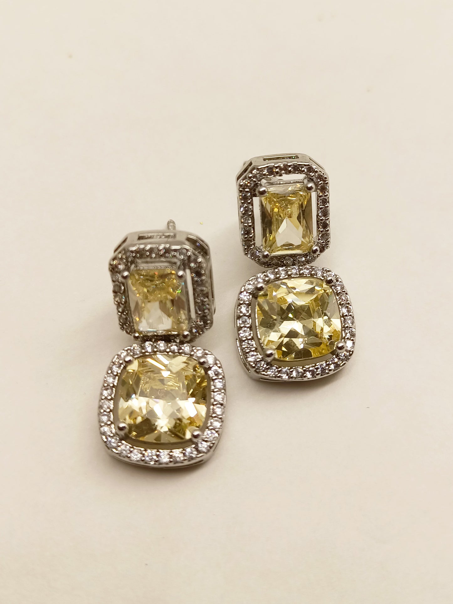 Rituja Yellow Stone Silver Plated Diamond Earrings