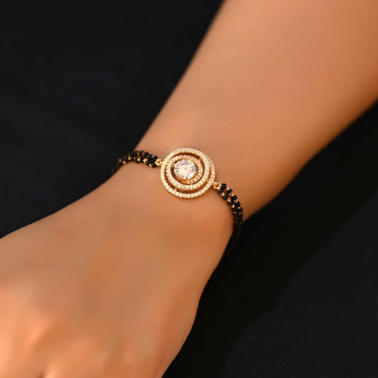 Sarla Diamond Piece With Black Beads Gold Plated Hand Mangal sutra