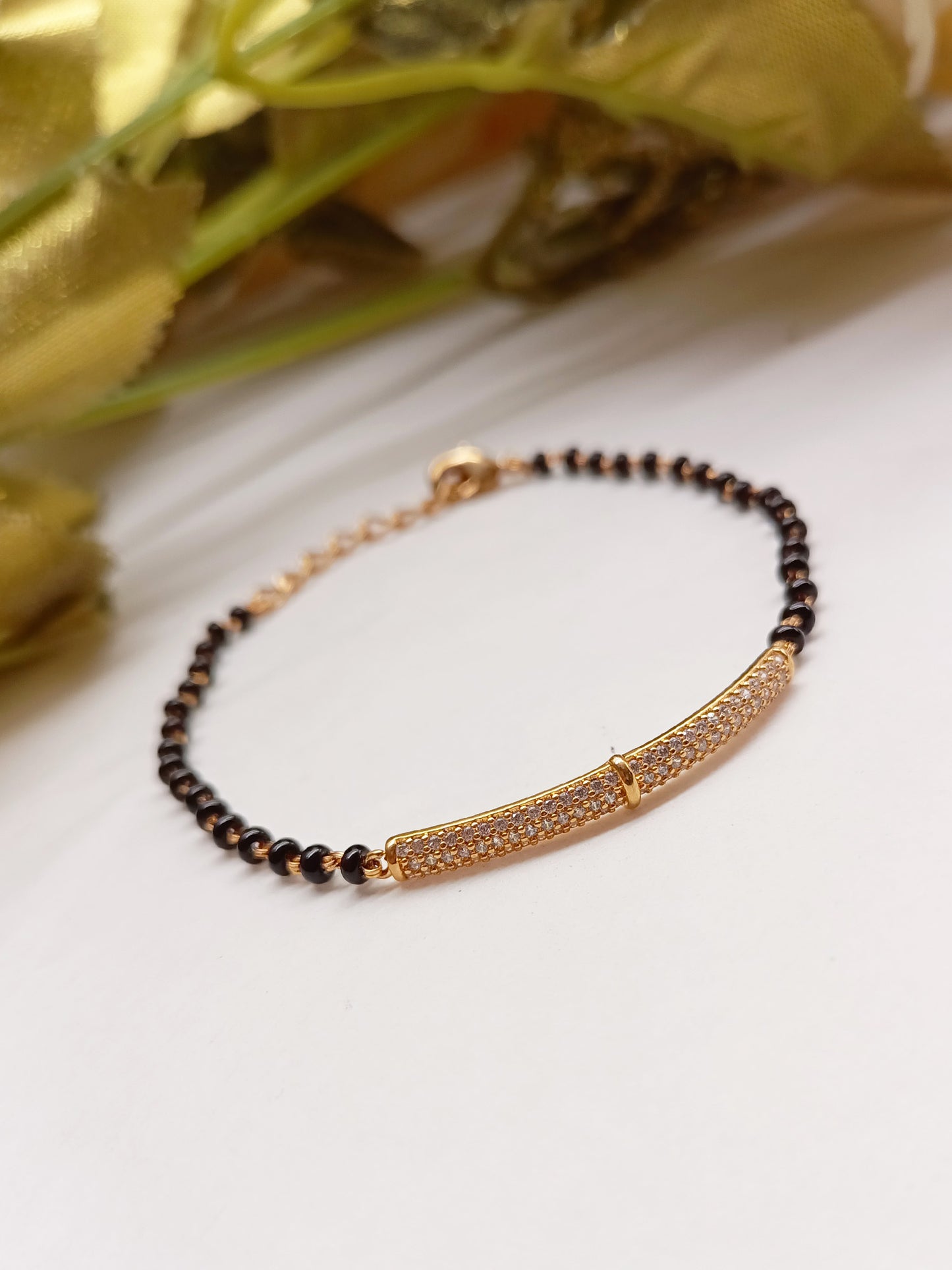 Mishel Diamond Piece With Black Beads Gold Plated Hand Mangal Sutra