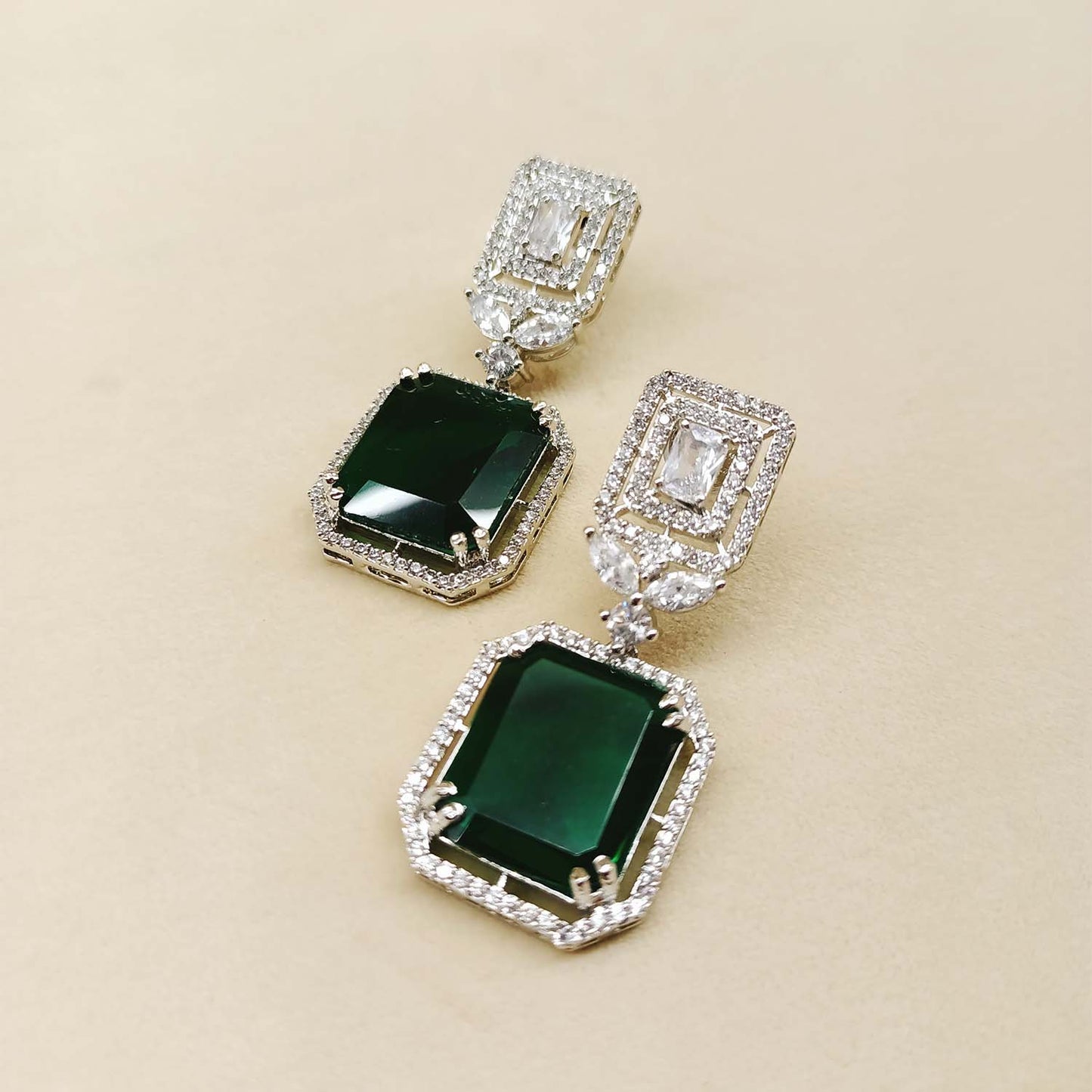Devika Green Emerald Stone American Diamond Danglers