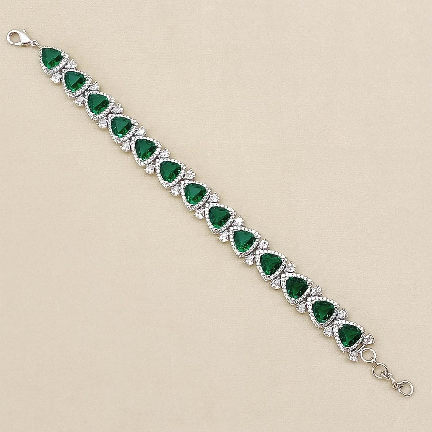 Vasanti Green Stoned And Silver Plated American Daimond Flexible Braclet