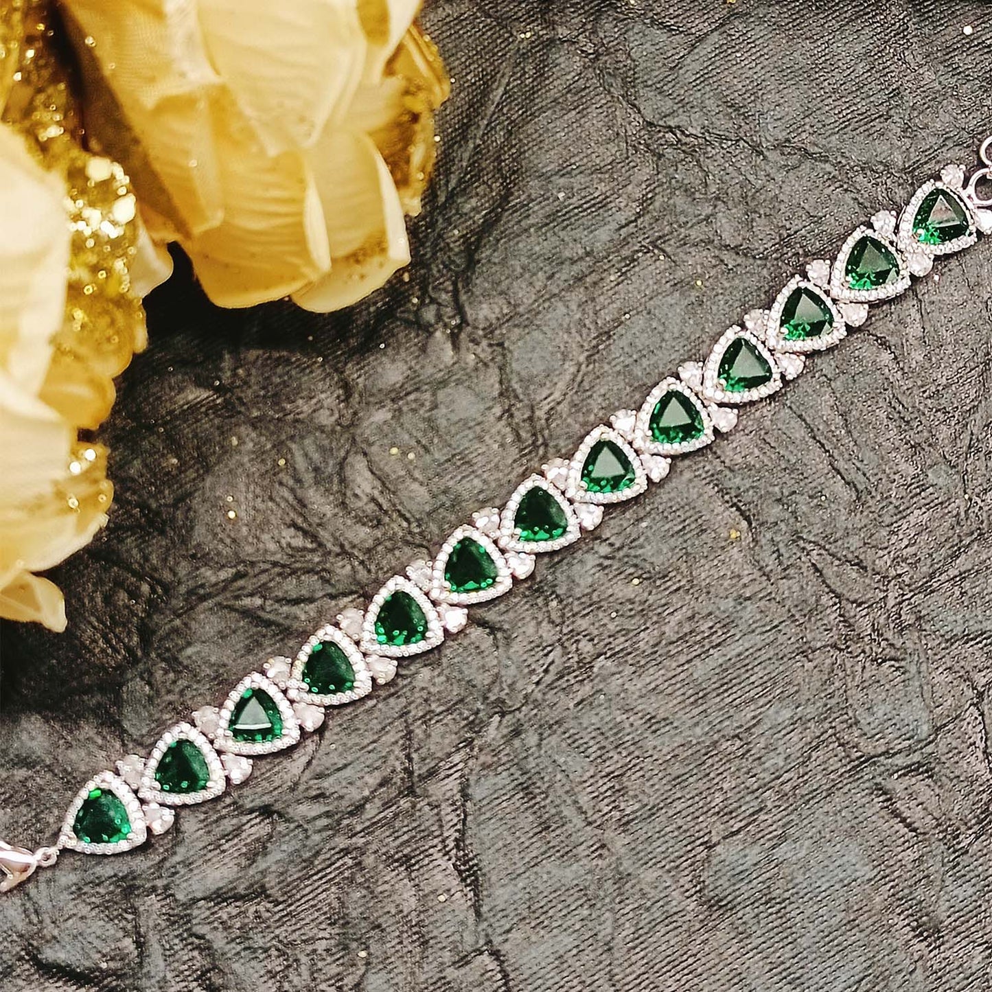 Vasanti Green Stoned And Silver Plated American Daimond Flexible Braclet