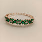 Vasu Emerald Green Stones Rose Plated American Diamond Bracelet